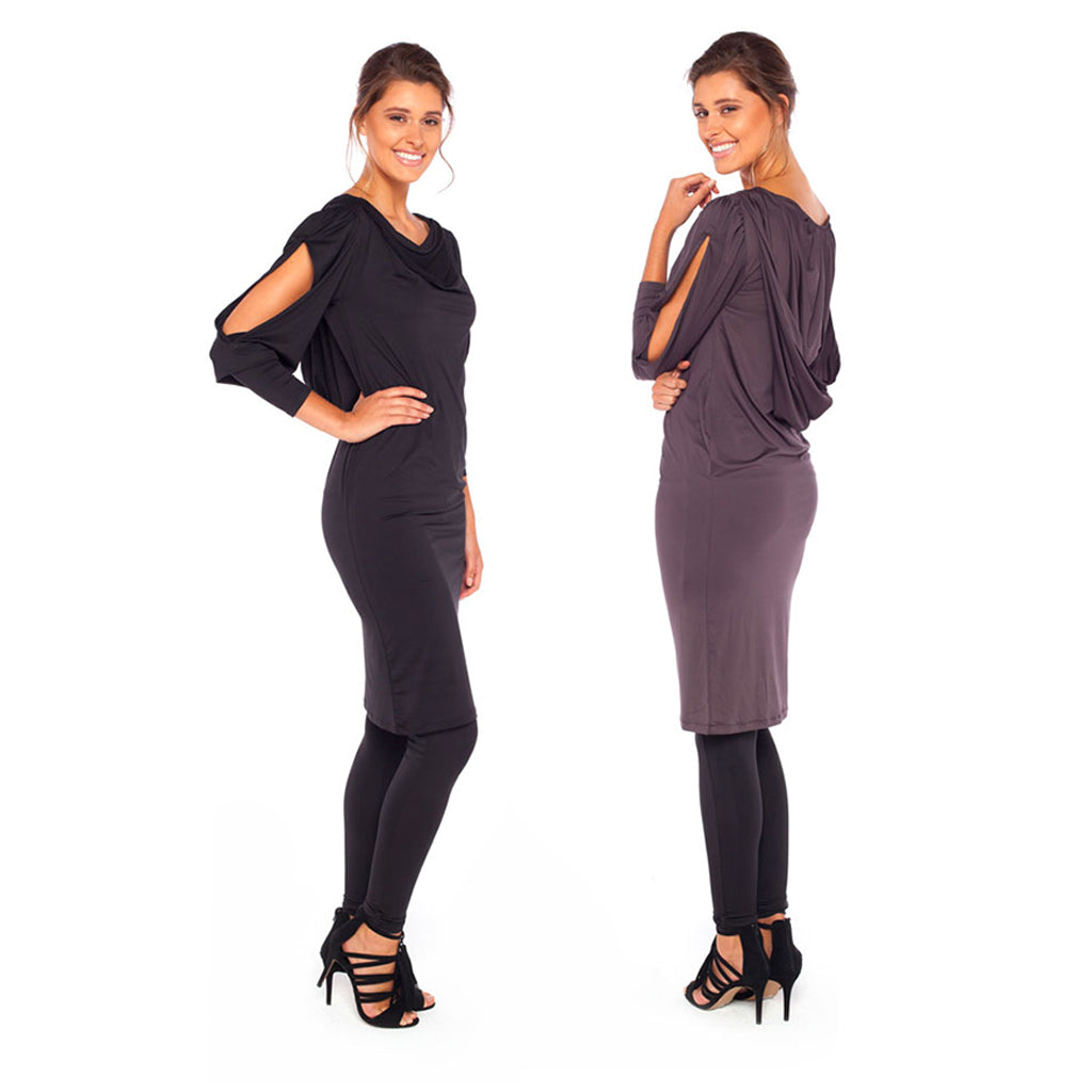 two women wear Australian and New Zealand women's clothing label, Urban Silk's Hooded Dress with heels for eveningwear. The Hooded Dress is designed in Australia and made in slinky jersey. It has a cowl neck, draped hood and full length sleeves. In black and neutral khaki, the short going-out dress is worn over skinny black legging-style pants.