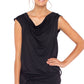 A woman wears a black, sleeveless hooded top with cowl neck. Designed by Australian leisurewear brand, Urban Silk, this hoodie top is comfortable for travel and casual wear. While it's slinky fabric makes for an elegant black evening top for women. Shop in Urban Silk Australia's online fashion boutique.