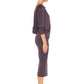 Woman wearing a hooded top in slinky jersey with batwing sleeves worn with a cylinder-shape pencil skirt and styled with heels for work wear style or low-key going out style. Designed in Australia and made for petite to plus size women