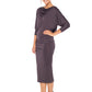 Woman wearing a hooded top in slinky jersey with batwing sleeves worn with a cylinder-shape pencil skirt and styled with heels for work wear style or low-key going out style. Designed in Australia and made for petite to plus size women