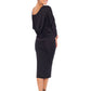 Woman wearing black jersey hooded top with batwing sleeves worn with black cylinder-shape pencil skirt and styled with heels for work style or low-key evening glamour. shop jersey tops and skirts designed in Australia for petite to plus size women.