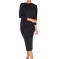 Woman wearing black jersey hooded top with batwing sleeves worn with black cylinder-shape pencil skirt and styled with heels for work style or low-key evening glamour. shop jersey tops and skirts designed in Australia for petite to plus size women.