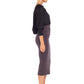 Woman wearing black jersey hooded top with batwing sleeves worn tucked into cylinder-shaped pencil skirt in Donkey and heels for a work wear look or going out style. Designed in Australia for petite to plus size women.