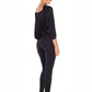 Woman wearing black jersey hooded top with batwing sleeves worn with black slim leg legging pants and styled with heels for work style or low-key evening glamour. shop jersey tops and pants designed in Australia for petite to plus size women.