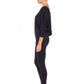 Woman wearing black jersey hooded top with batwing sleeves worn with black slim leg legging pants and styled with heels for work style or low-key evening glamour. shop jersey tops and pants designed in Australia for petite to plus size women.