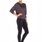 Woman wearing a hooded top in slinky jersey with batwing sleeves worn with slim-leg, long-length, black legging trousers and styled with heels for work wear style or low-key going out style. Designed in Australia and made for petite to plus size women