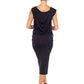 Back view of a woman wearing a black tube skirt worn with a sleeveless black hooded top in silky jersey to give the look of a slinky black hooded jersey dress for relaxed evening glamour and going-out wear style. Designed in Australia by Urban Silk leisurewear.