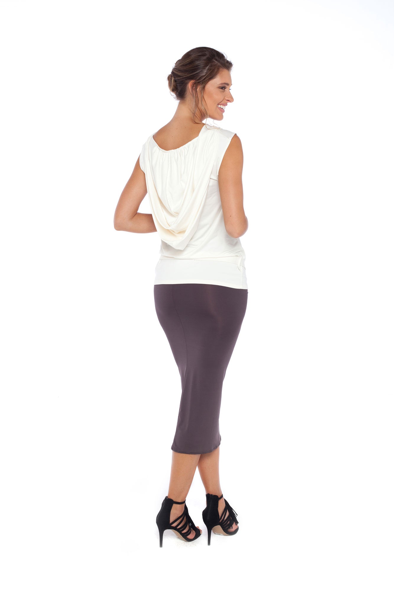 Back view of a woman wear leisurewear brand Australia, Urban Silk's Sleeveless Hooded jersey Top in Ivory and a khaki jersey pencil skirt. Shop smart casual work wear, corporate wear for the young professionals and easy business travel outfits at Urban Silk clothing and feel as good as she looks!