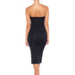 Back view of curvy hipped woman wearing strapless black tube dress in silky jersey, designed in Australia by Urban Silk leisurewear