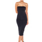 Curvy hipped woman wearing strapless black tube dress in silky jersey, designed in Australia by Urban Silk leisurewear